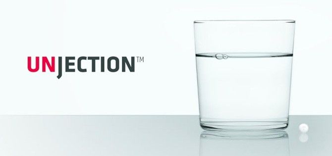 unjection logo with glass of water and pill